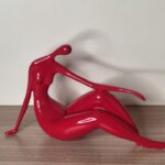 Red Sitting Lady Sculpture